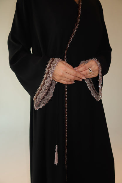 Handcrafted with beads in shades of brown