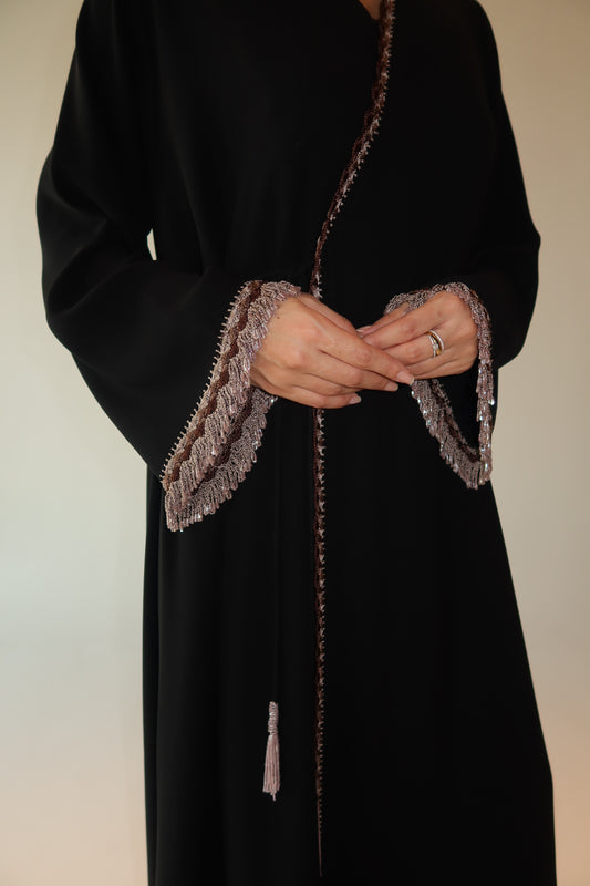 Handcrafted with beads in shades of brown