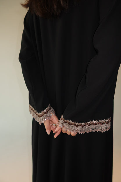 Handcrafted with beads in shades of brown